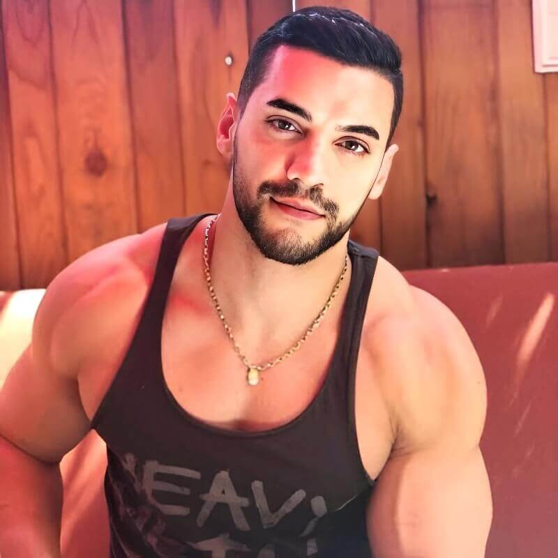 Arad Win-Win, muscular gay performer with defined physique and commanding energy