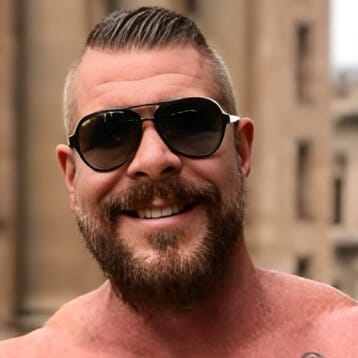 Rocco Steele, gay adult performer with strong build